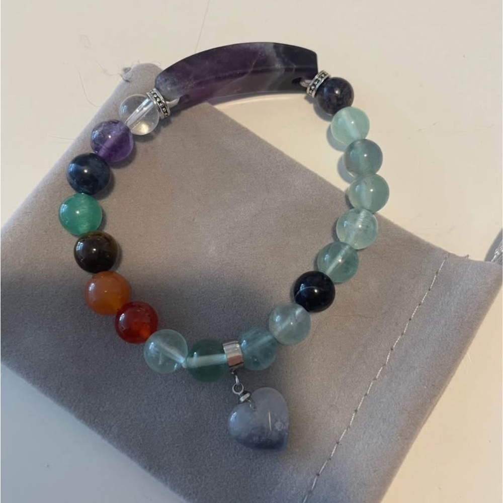 Bracelet with large purple stone and colorful beads and stone heart charm